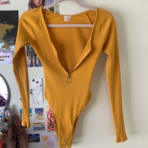 Yellow bodysuit